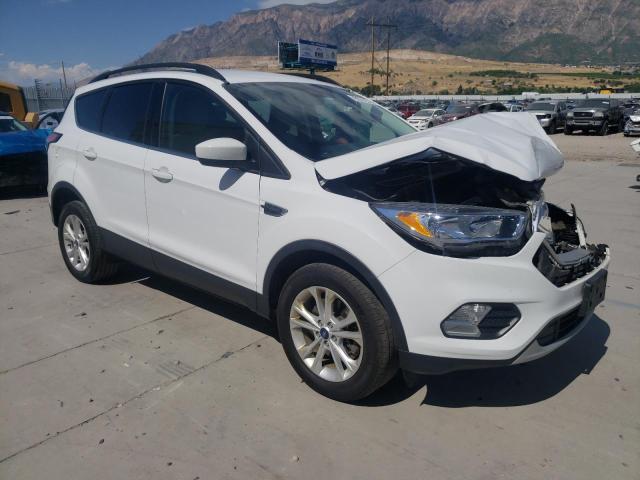 FORD ESCAPE SE 2018 with VIN 1FMCU9GD0JUD21167 - Photo from auction