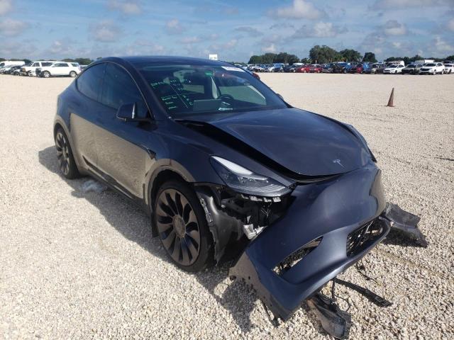 TESLA MODEL Y 2021 with VIN 5YJYGDEF8MF304767 - Photo from auction