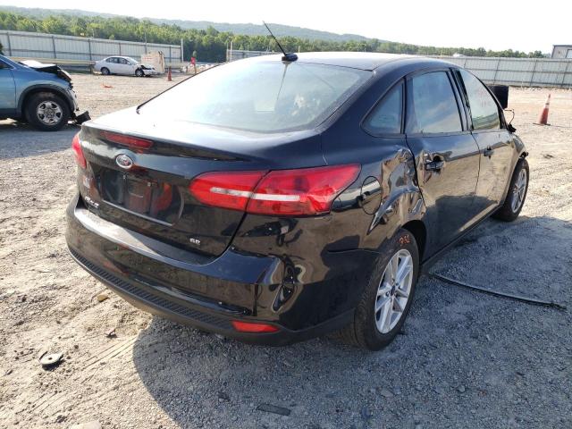 Photo 4 from auction – 2017 FORD FOCUS SE with VIN 1FADP3F23HL294601