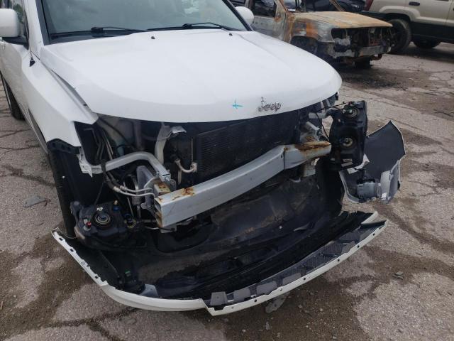 Photo 9 from auction – 2014 JEEP COMPASS LA with VIN 1C4NJCEA2ED883265