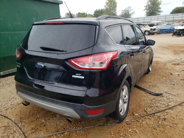 Photo 4 from auction – 2016 FORD ESCAPE SE with VIN 1FMCU0G95GUA40398