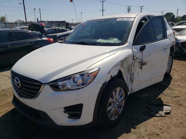 Photo 2 from auction – 2016 MAZDA CX-5 SPORT with VIN JM3KE2BY1G0900206