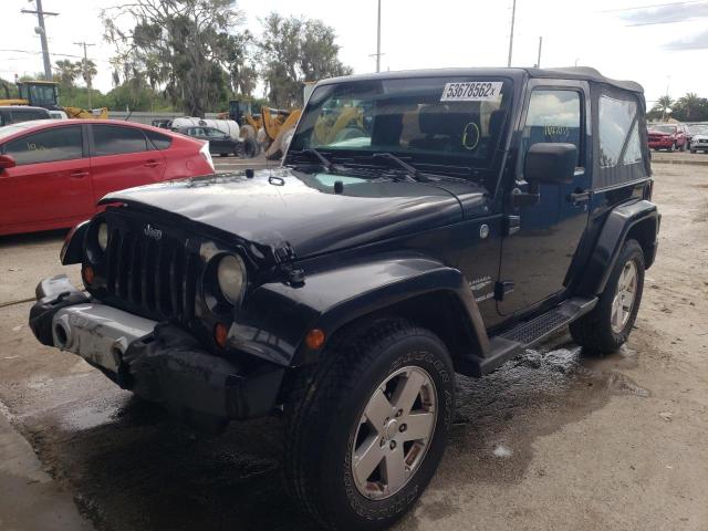 Photo 2 from auction – 2011 JEEP WRANGLER S with VIN 1J4AA5D17BL558571