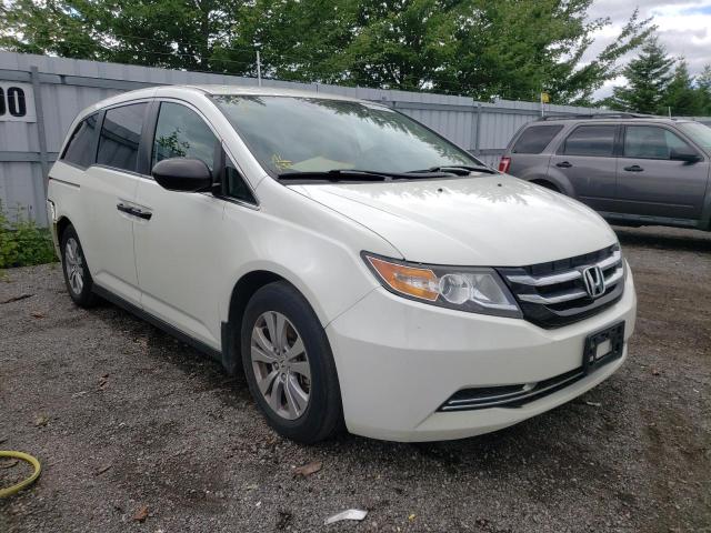 HONDA ODYSSEY SE 2014 with VIN 5FNRL5H32EB506612 - Photo from auction