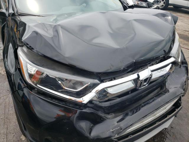 Photo 9 from auction – 2017 HONDA CR-V LX with VIN 7FARW5H34HE001056