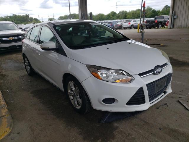 FORD FOCUS SE 2014 with VIN 1FADP3K28EL301351 - Photo from auction