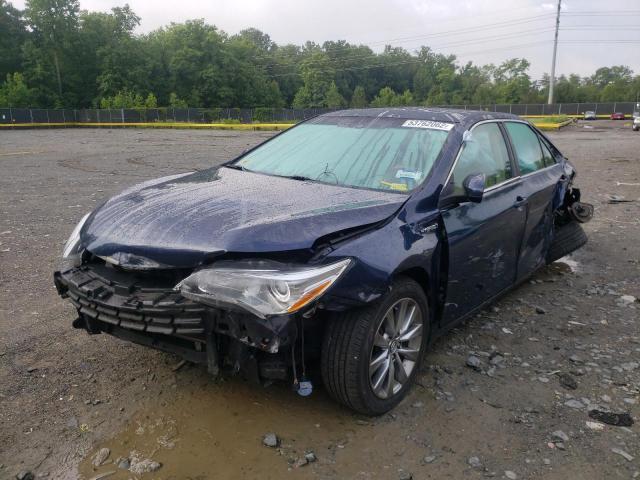 Photo 2 from auction – 2016 TOYOTA CAMRY HYBR with VIN 4T1BD1FK6GU189232