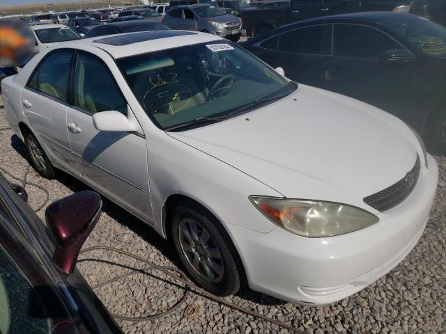 TOYOTA CAMRY LE 2002 with VIN 4T1BF30K72U019758 - Photo from auction