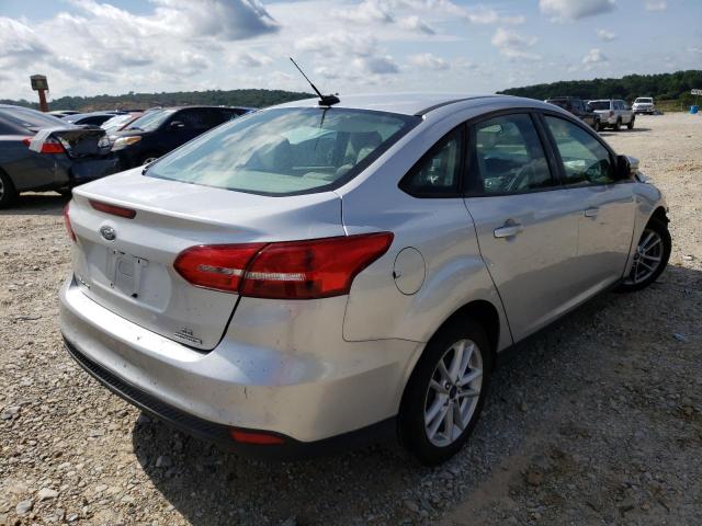 Photo 4 from auction – 2016 FORD FOCUS with VIN 1FADP3F21GL365129
