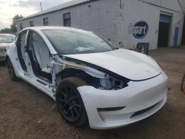 TESLA MODEL 3 2021 with VIN 5YJ3E1EA2MF061525 - Photo from auction