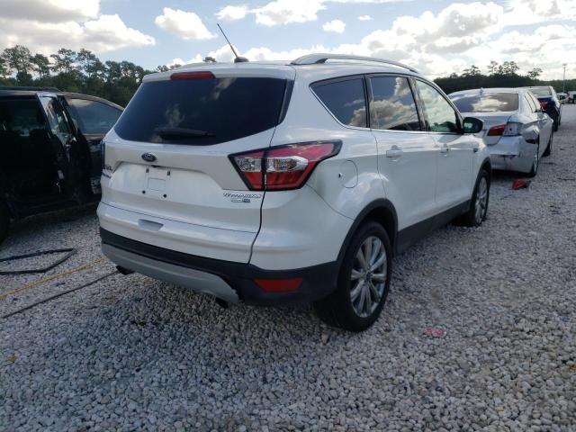 Photo 4 from auction – 2017 FORD ESCAPE TIT with VIN 1FMCU9J98HUF03651