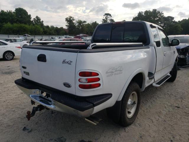 Photo 4 from auction – 2000 FORD F150 with VIN 1FTRX08L7YKA37225