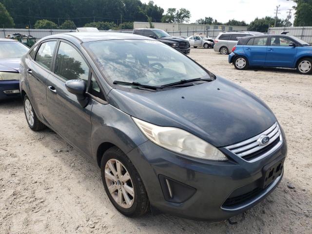 FORD FIESTA SE 2011 with VIN 3FADP4BJ9BM200570 - Photo from auction