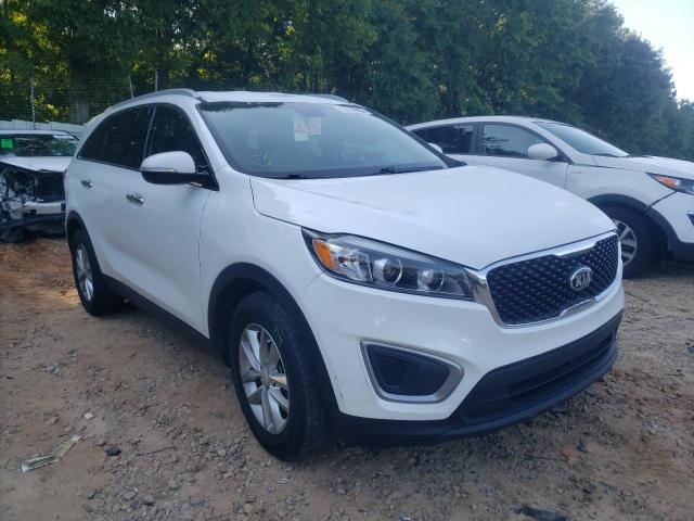 KIA SORENTO LX 2016 with VIN 5XYPG4A31GG076566 - Photo from auction