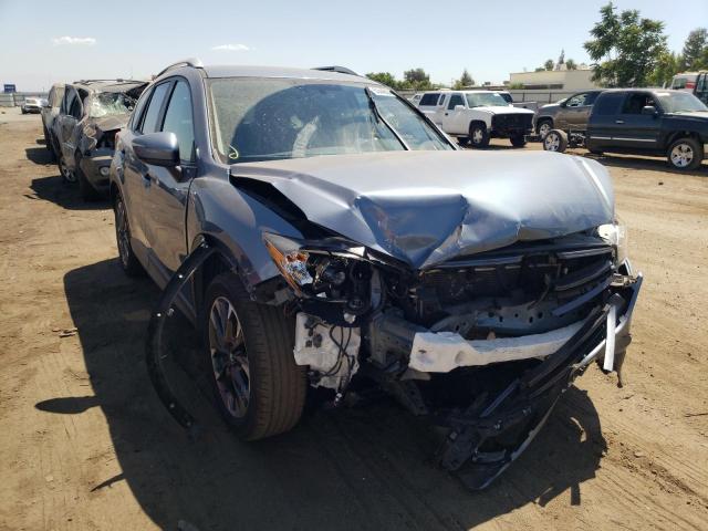 Photo 9 from auction – 2016 MAZDA CX-5 GT with VIN JM3KE2DY6G0818680