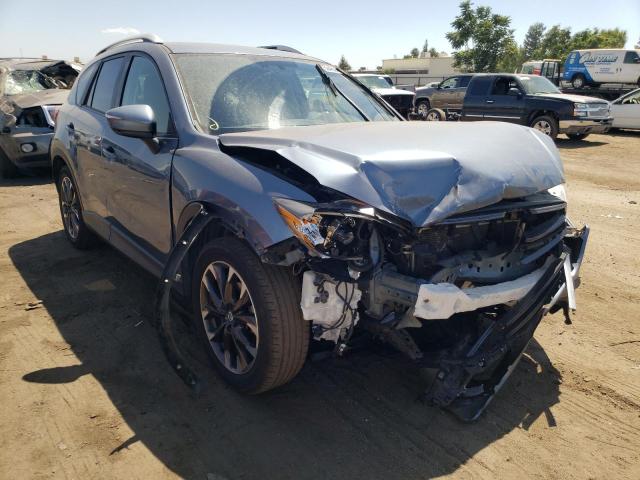 MAZDA CX-5 GT 2016 with VIN JM3KE2DY6G0818680 - Photo from auction