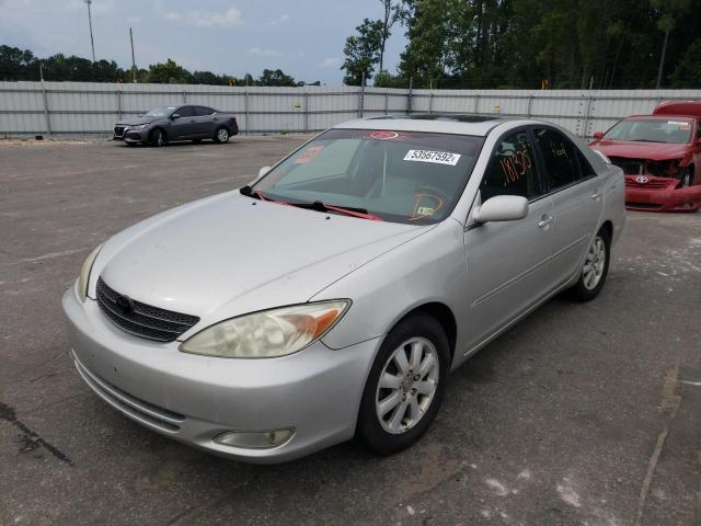 Photo 2 from auction – 2004 TOYOTA CAMRY LE with VIN 4T1BE30K84U878153