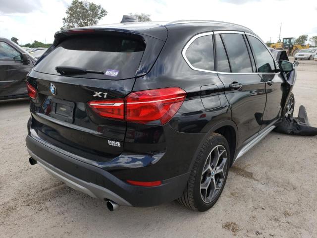 Photo 4 from auction – 2016 BMW X1 XDRIVE2 with VIN WBXHT3C30G5E52020