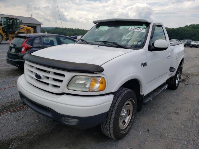 Photo 2 from auction – 2003 FORD F150 with VIN 1FTRF08293KD54782