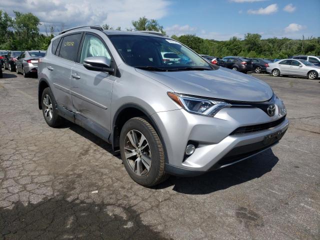 Photo 1 from auction – 2017 TOYOTA RAV4 XLE with VIN 2T3RFREV7HW555405