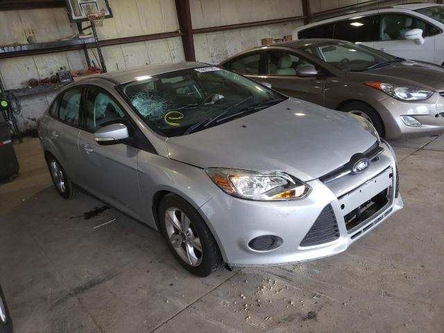 FORD FOCUS SE 2014 with VIN 1FADP3F24EL150258 - Photo from auction