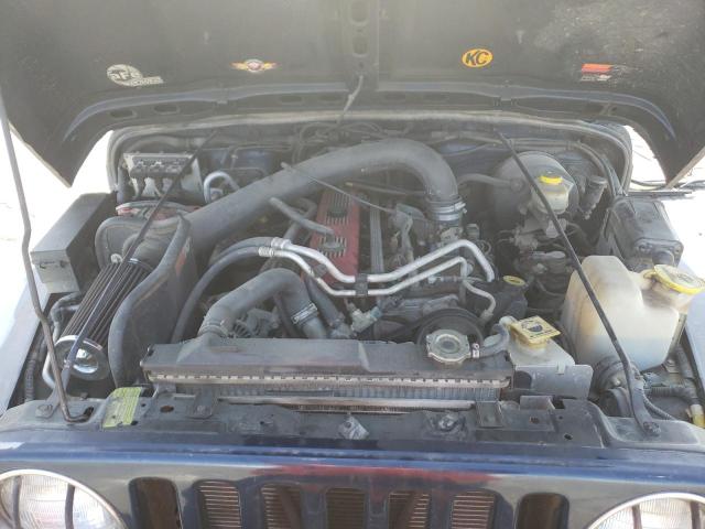 Photo 7 from auction – 2004 JEEP WRANGLER X with VIN 1J4FA39S84P769057