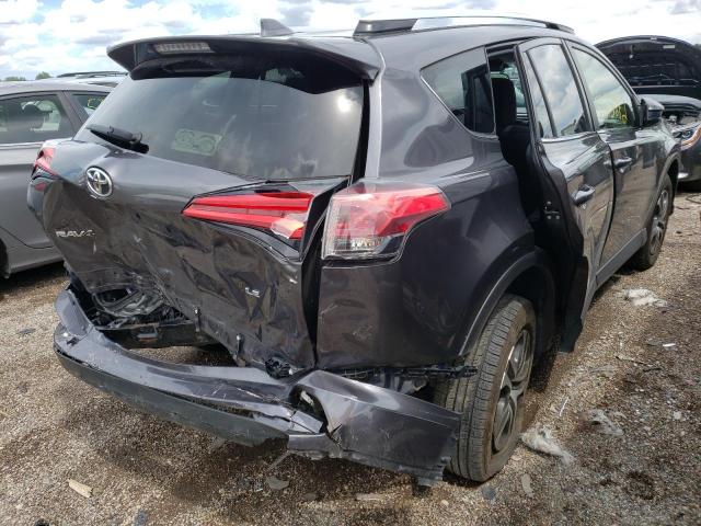 Photo 4 from auction – 2016 TOYOTA RAV4 LE with VIN JTMZFREV4GJ063833