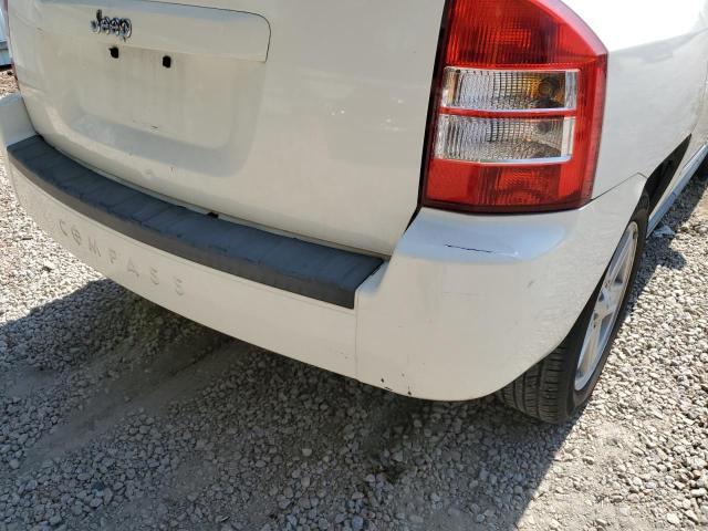 Photo 9 from auction – 2010 JEEP COMPASS SP with VIN 1J4NT4FB1AD611897
