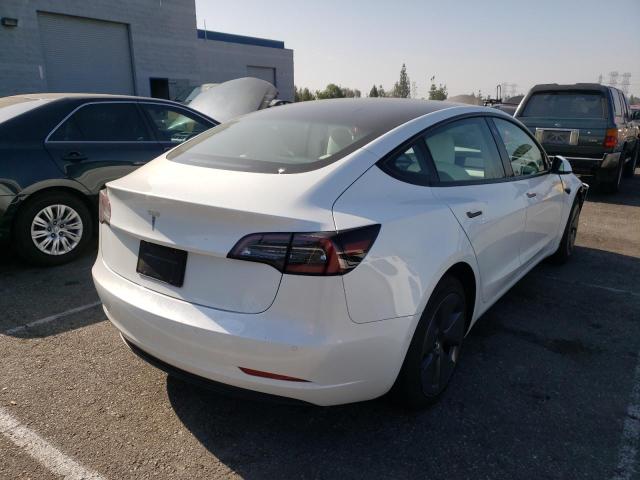 Photo 4 from auction – 2021 TESLA MODEL 3 with VIN 5YJ3E1EA0MF053374