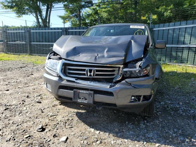 Photo 9 from auction – 2013 HONDA RIDGELINE with VIN 5FPYK1F54DB017114
