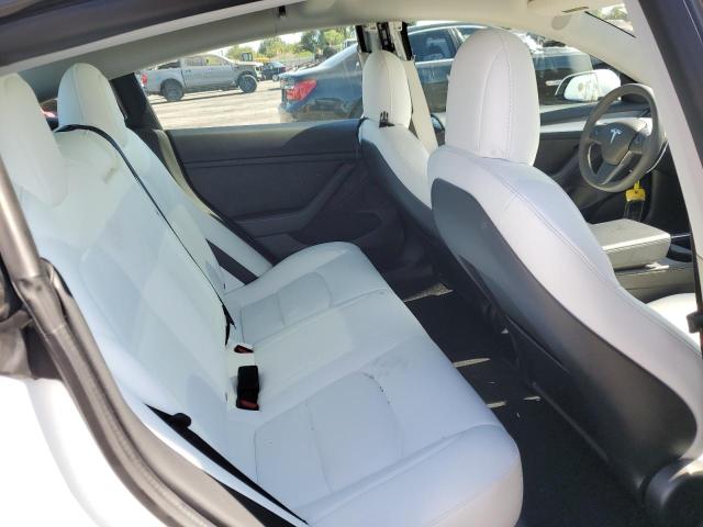 Photo 6 from auction – 2021 TESLA MODEL 3 with VIN 5YJ3E1EC1MF077085
