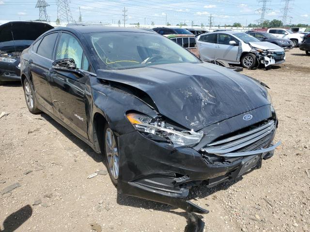 FORD FUSION SE 2018 with VIN 3FA6P0LU0JR135703 - Photo from auction