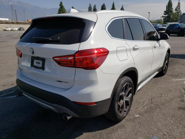 Photo 4 from auction – 2018 BMW X1 SDRIVE2 with VIN WBXHU7C30J5L06791