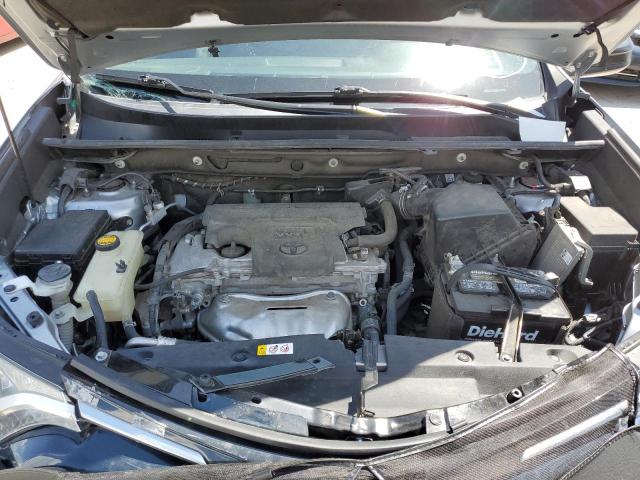 Photo 7 from auction – 2018 TOYOTA RAV4 LE with VIN 2T3BFREV7JW698863