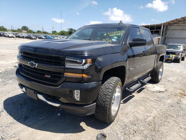 Photo 2 from auction – 2018 CHEVROLET SILVERADO with VIN 3GCUKREC1JG586448