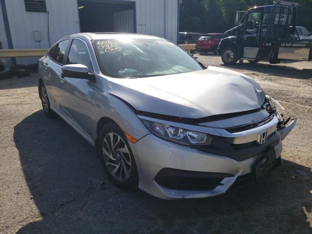 HONDA CIVIC EX 2017 with VIN 19XFC2F79HE042090 - Photo from auction