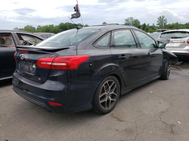 Photo 4 from auction – 2016 FORD FOCUS SE with VIN 1FADP3F21GL300491
