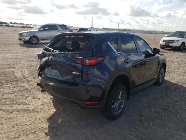 Photo 4 from auction – 2021 MAZDA CX-5 TOURI with VIN JM3KFBCM2M1500718