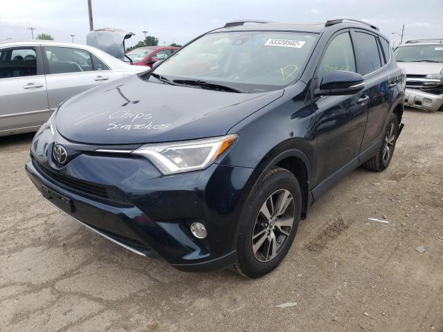 Photo 2 from auction – 2017 TOYOTA RAV4 XLE with VIN JTMRFREVXHD208776