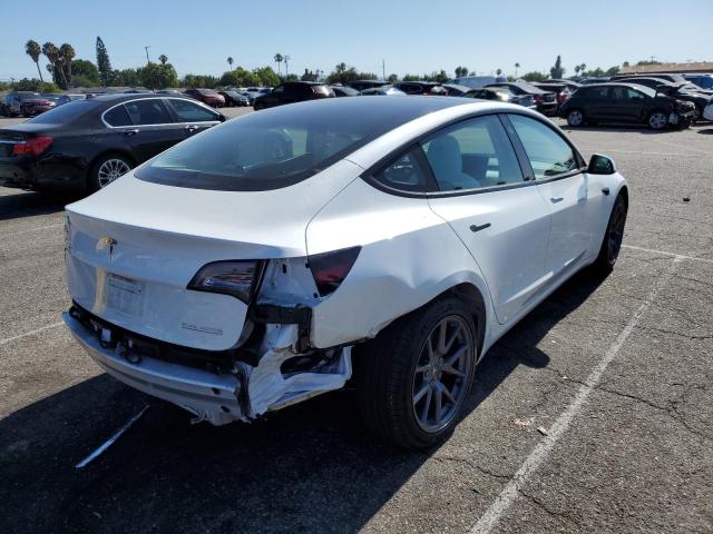 Photo 4 from auction – 2021 TESLA MODEL 3 with VIN 5YJ3E1EC1MF077085