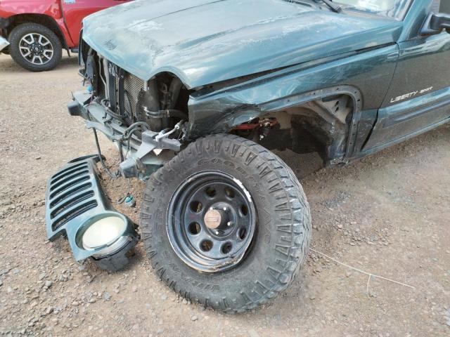 Photo 9 from auction – 2002 JEEP LIBERTY SP with VIN 1J4GL48K82W143937
