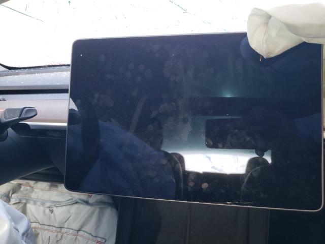 Photo 8 from auction – 2021 TESLA MODEL 3 with VIN 5YJ3E1EB1MF073366