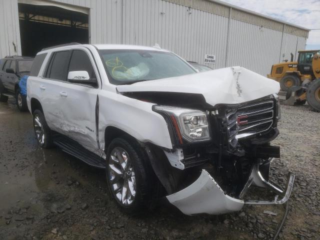 GMC YUKON SLE 2019 with VIN 1GKS2AKC4KR302426 - Photo from auction