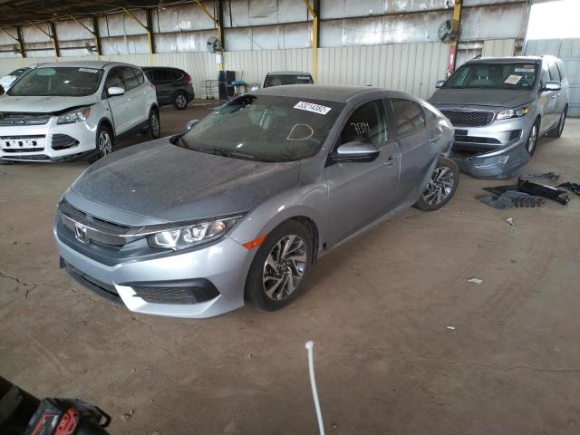Photo 2 from auction – 2018 HONDA CIVIC EX with VIN 19XFC2F77JE013841