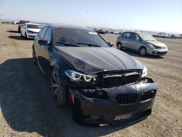 BMW M5 2014 with VIN WBSFV9C52ED593523 - Photo from auction