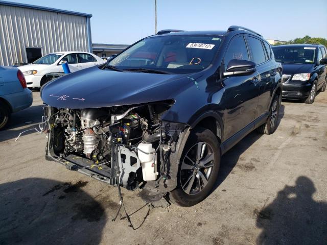 Photo 2 from auction – 2017 TOYOTA RAV4 XLE with VIN JTMWFREV4HJ117622