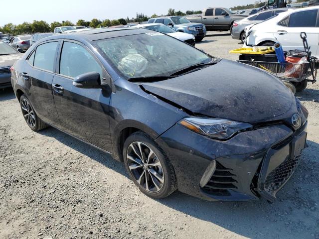 TOYOTA COROLLA L 2019 with VIN 5YFBURHE2KP873582 - Photo from auction
