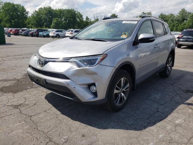 Photo 2 from auction – 2017 TOYOTA RAV4 XLE with VIN 2T3RFREV7HW555405