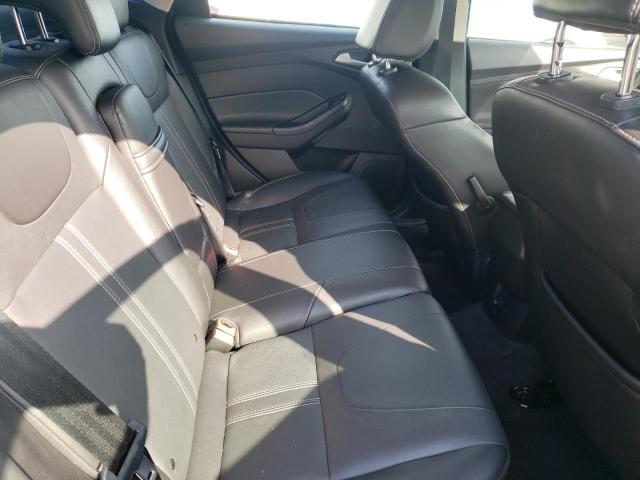 Foto 6 de la subasta – 2013 FORD FOCUS SE con VIN 1FADP3F21DL283669