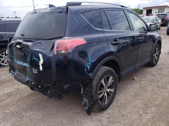Photo 4 from auction – 2017 TOYOTA RAV4 XLE with VIN JTMRFREVXHD208776